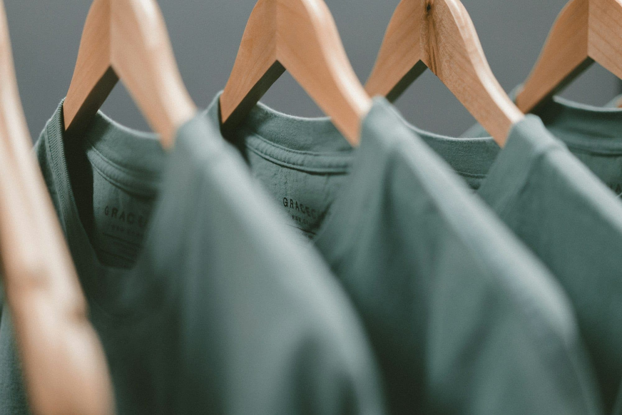 Finished garments on hangers awaiting final inspection